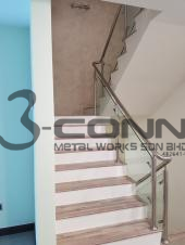 Stainless steel staircase with tempered glass